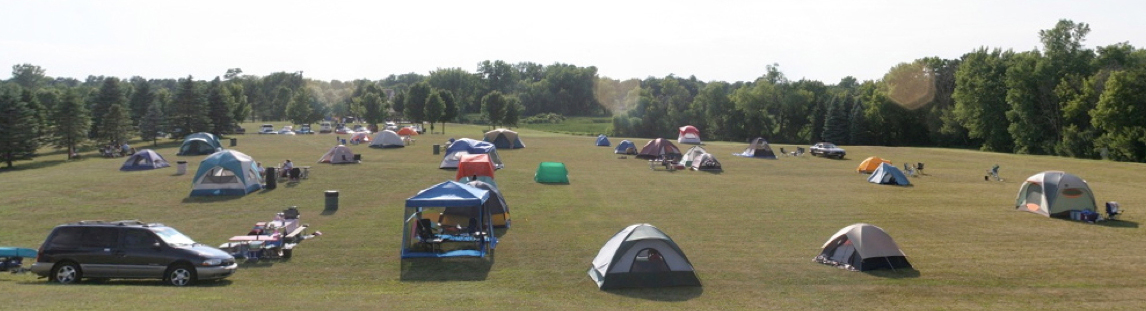 Panoramic image of campsites at star event